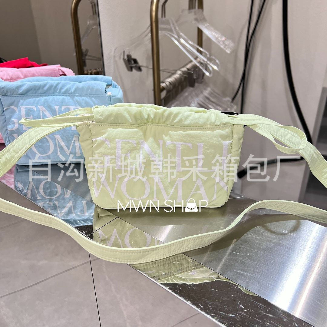 Diseño de nicho de mini albóndigas de la marca tailandesa de moda Gentle Woman 2024 nuevo bolso de hombro con cuerda de extracción