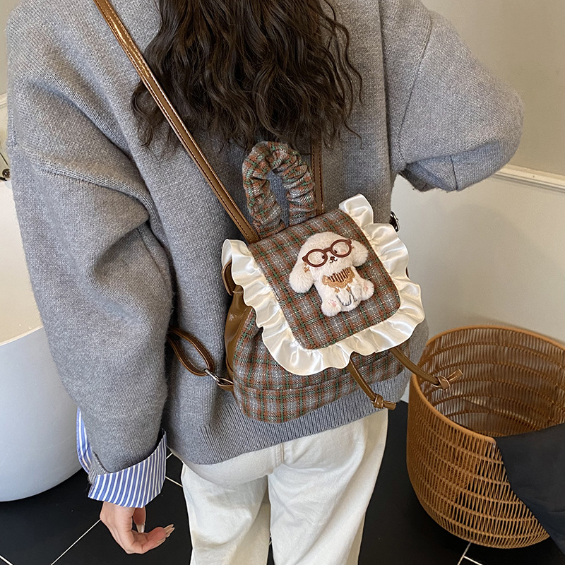 Otoño y invierno nueva mochila infantil coreana encaje mochila a cuadrícula para niños y niñas mochilas de dibujos animados cachorros mochilas de bebés