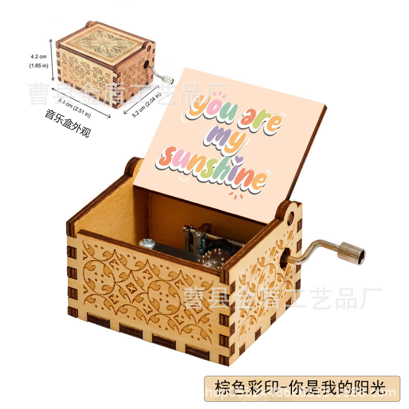 木製の手で音楽箱のアイデアを揺らします。|undefined