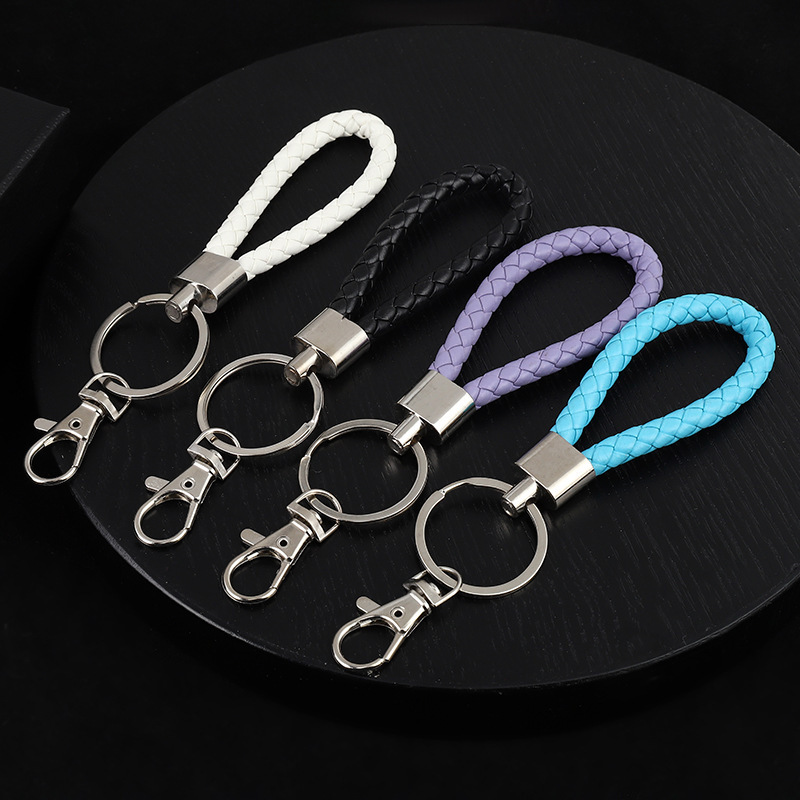 Spot wholesale woven leather rope keychain men's and women's DIY handmade car key accessories metal ring pendant decoration Spot wholesale woven leather rope keychain men's and women's DIY handmade car key accessories metal ring pendant decoration