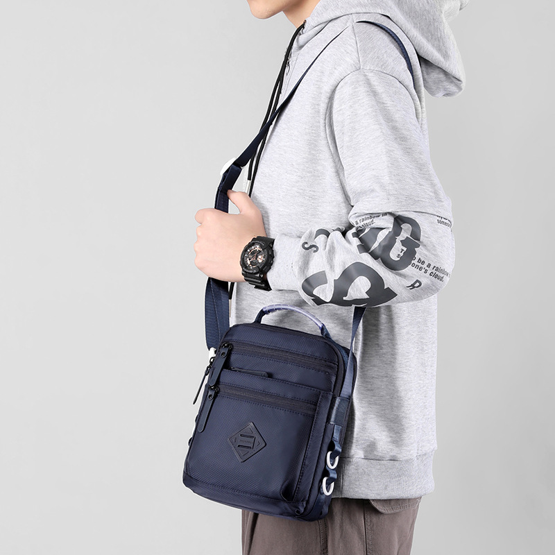 Nueva moda bolso de los hombres bolsa de negocios personalizada unisex pero stirring tendencia crossbody bolsa pequeña bolsa cuadrada