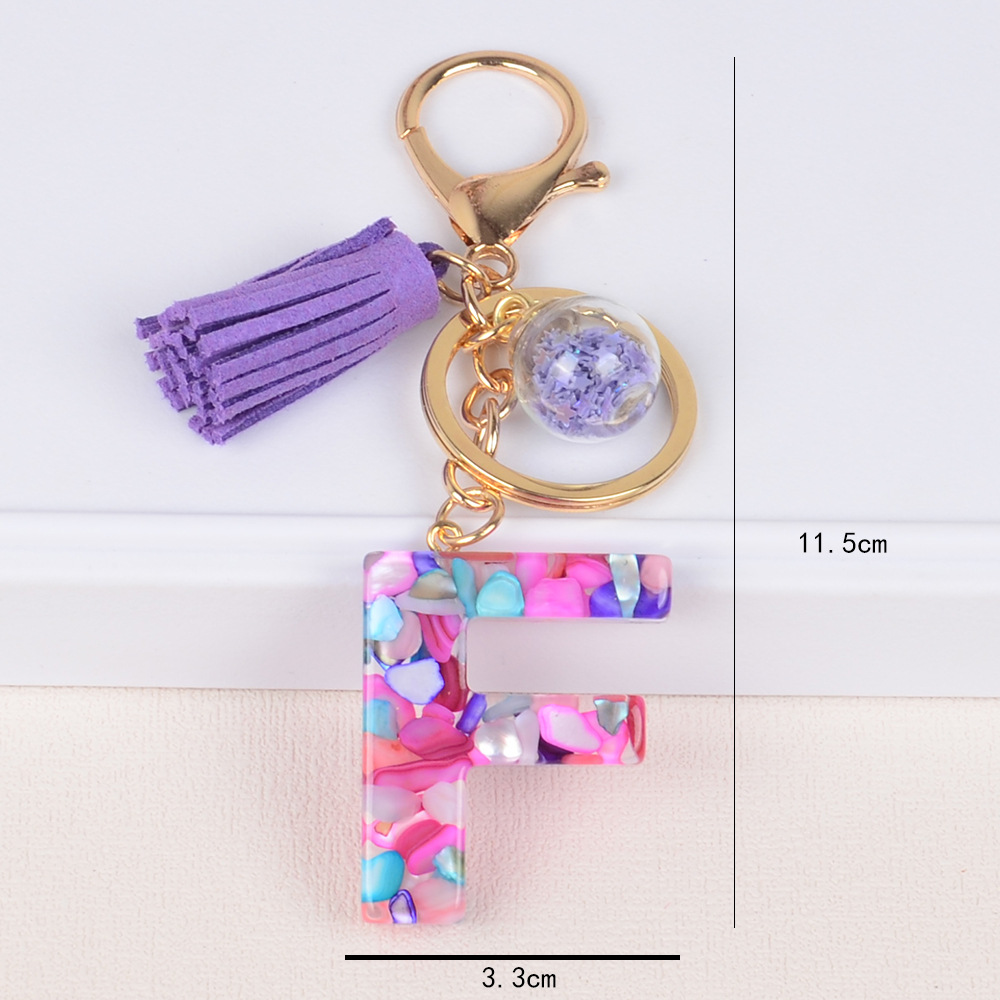 Moda estilo europeo y americano 26 inglés letras llavero cristal epoxi color piedra letra borla colgante bolsa