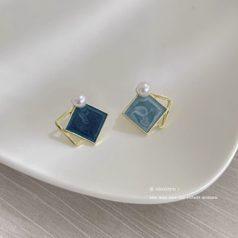 Aretes de aleación coreana de perlas de alto nivel de perlas largas al por mayor transfronterizas pendentes de cabina ligeros de lujo exagerados perfumes de orejas mujeres