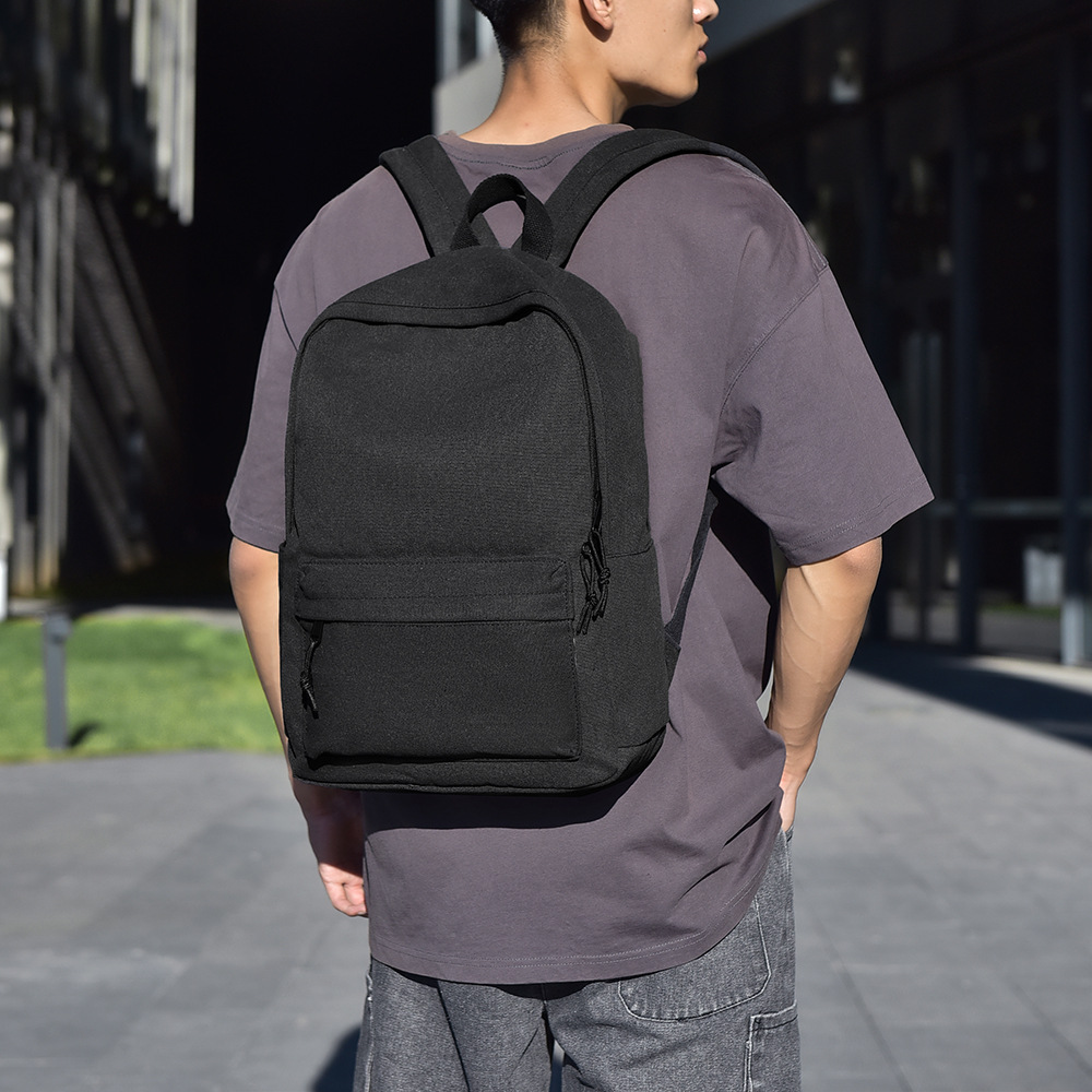 Transfronterizos otoño y invierno nuevo estilo simple poliéster mochila de hombro casual al aire libre de gran capacidad bolsa de viaje negra para hombres