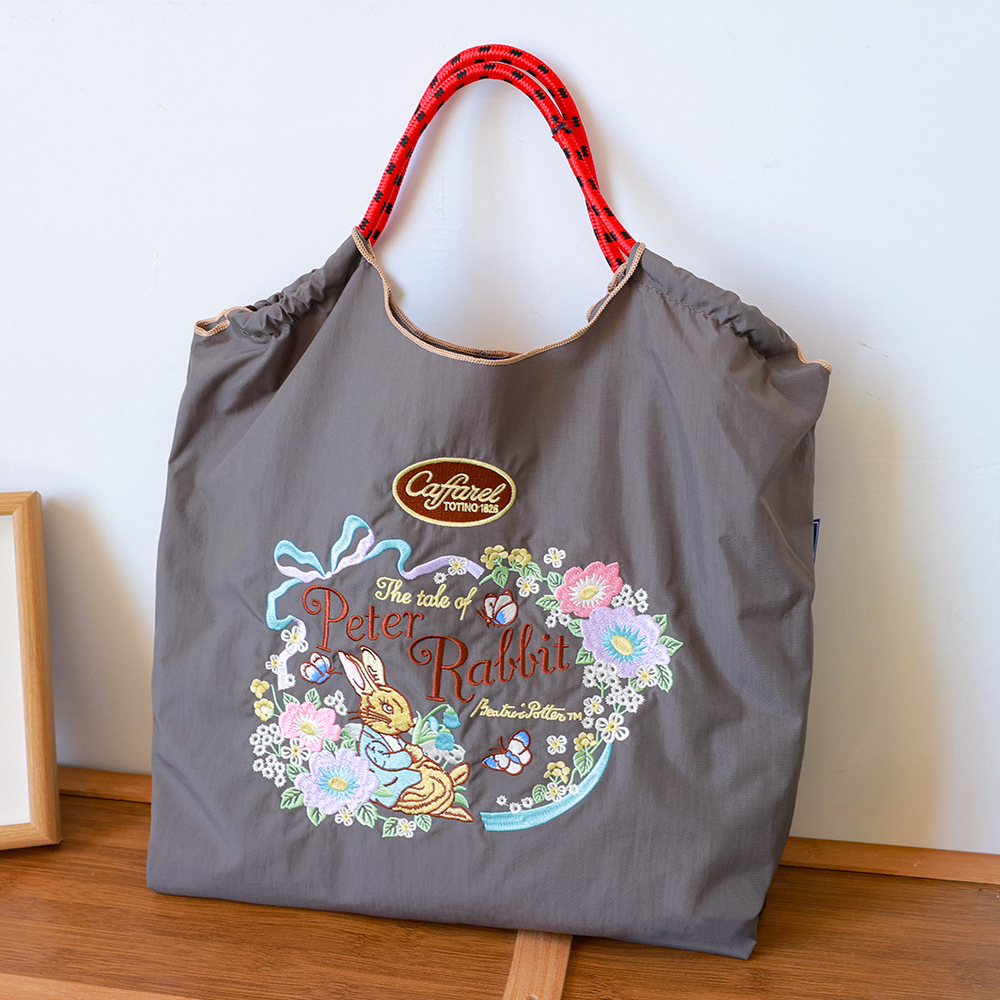 厳選ネット赤同項日系ボールチェーン刺繍レジ袋女性ファッション小衆大容量シングルバッグ潮