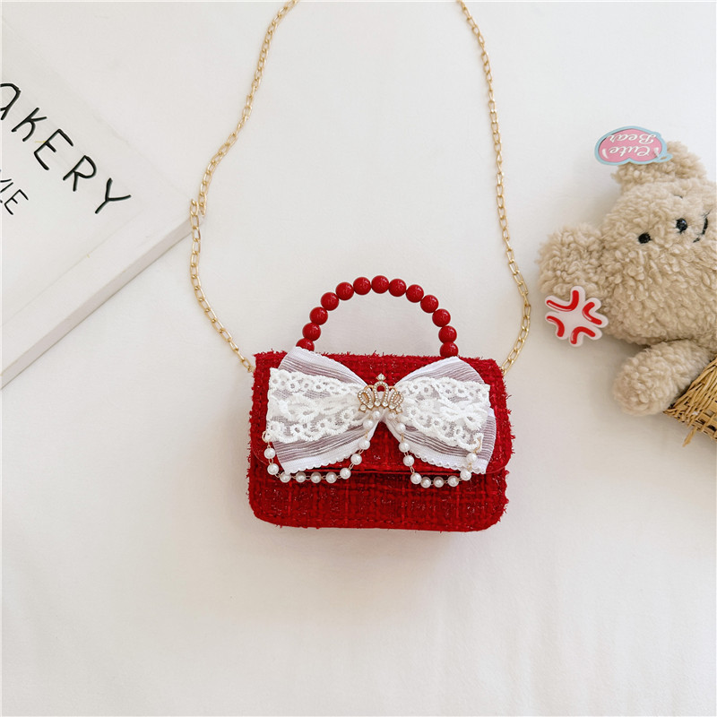 2024 nueva moda lindas bolsas de hombro para niños bolsas de perlas a cuadrícula bolsas extranjeras bolsas de hombro para niñas gran capacidad marea