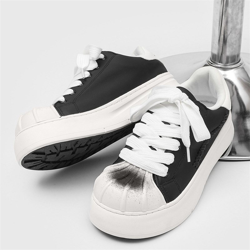 Zapatos casuales deportivos 2025 nuevos zapatos de moda con cabeza de concha de inyección de tinta zapatos de tabla de cabeza grande de corte bajo al aire libre zapatos de hombre de comercio exterior al por mayor