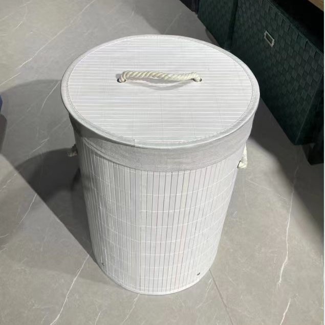 Cesta de lavandería a prueba de polvo transfronteriza cesta de lavandería cesta de almacenamiento tejida de bambú cubo de almacenamiento de ropa sucia tejida plegable de bambú al por mayor