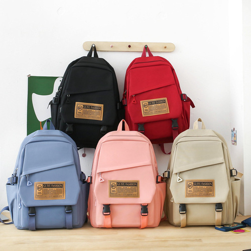 Wholesale Korean style casual backpack nylon large capacity junior high school student school bag 3-4 grade primary school student remedial bag