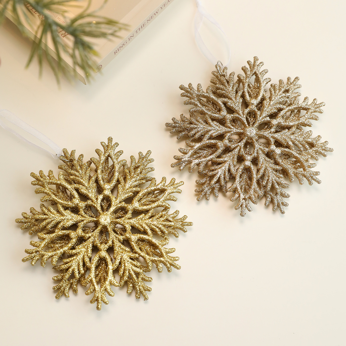 Colgante de árbol de Navidad transfronterizo polvo de oro copo de nieve plástico hueco tridimensional diseño de decoración de Navidad doble cara