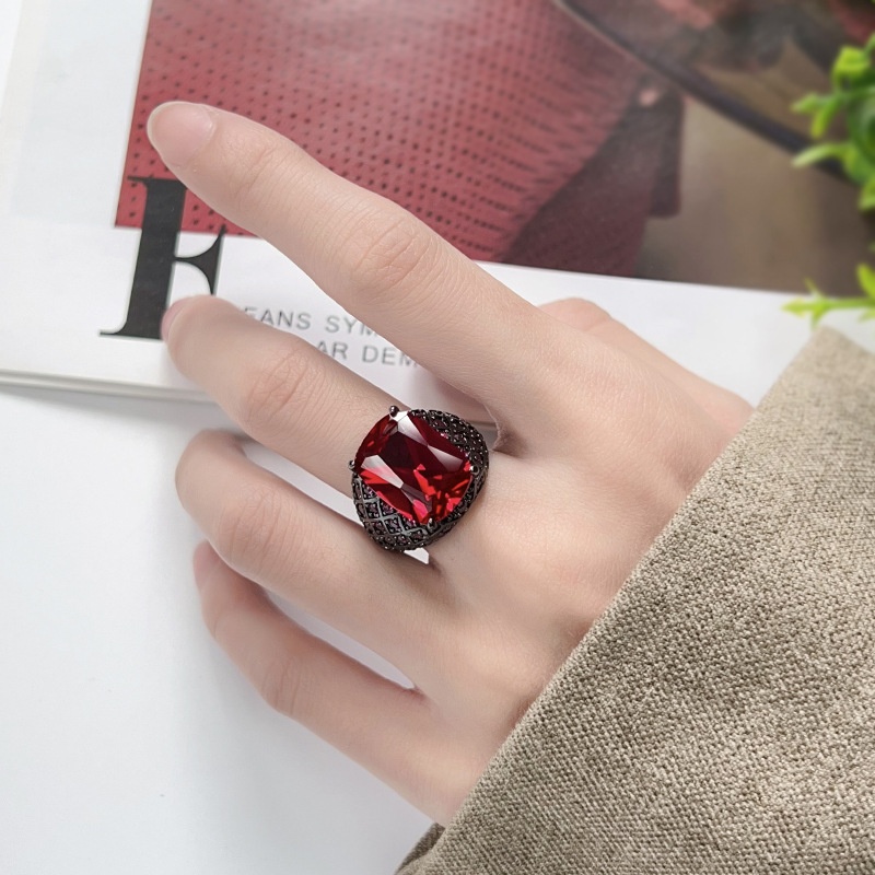 Otoño e invierno nuevo estilo Zhuang Shengsheng joyería fondo de cobre chapado en oro simulación cristal puntiagudo azul anillo retro mujer piedra 12*16