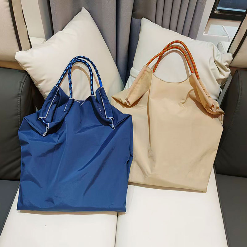 Direkt vom Hersteller: Bestickte Niche-Einkaufstasche aus Canvas, Umhängetasche oder Schultertasche, in verschiedenen Farben erhältlich._voghion.com