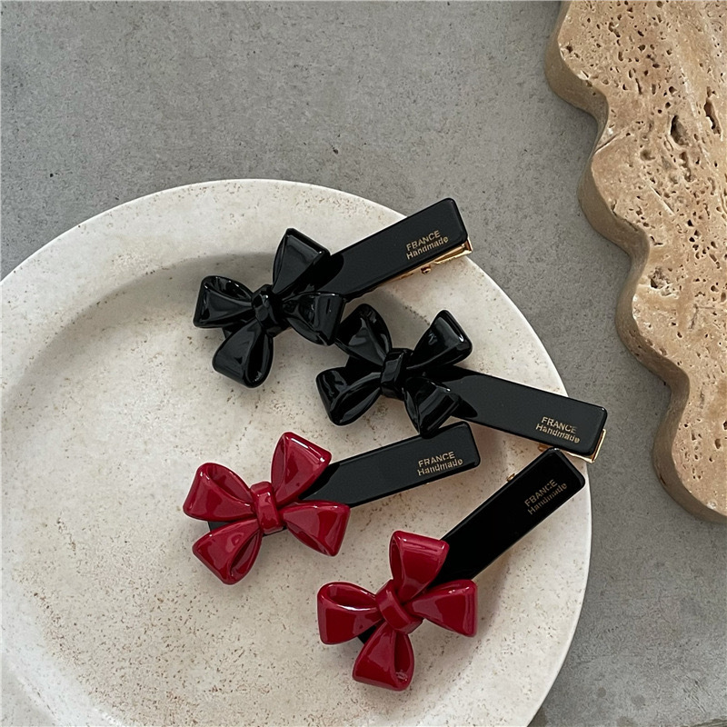 Sweet Bow Knot Arylic Hair Clip display picture 2