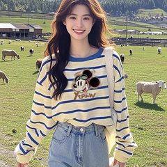 ユニークな丸首の冬の衝突色のストライプのフランスの気質の長袖のtシャツの女性の純綿の底のシャツの百合の上着