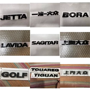 Black FAW-Volkswagen Jetta, Golf, Sagitar, Magotan, and Bora car emblems, Jetta rear lettering