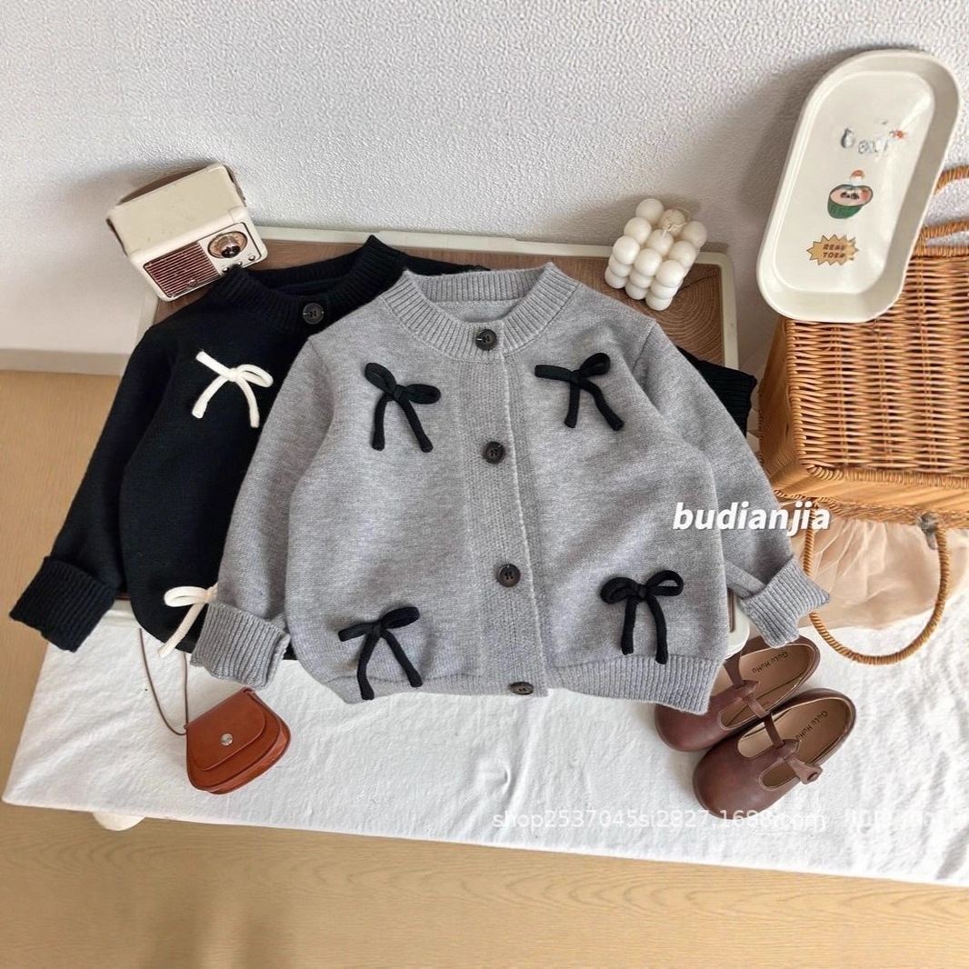 Girls' cardigan cardigan coat, thick style, 2026 new children's clothing, knitted sweater, autumn and winter baby Korean style round neck top