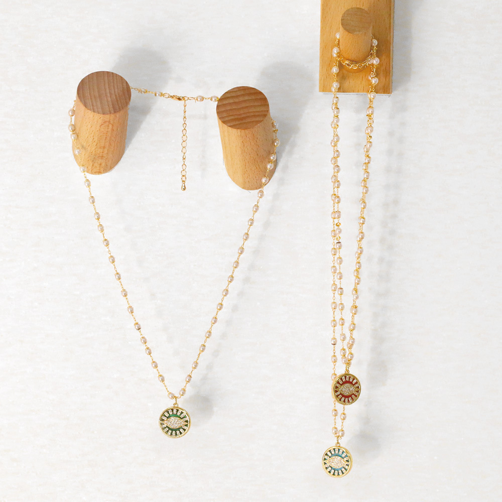 hip-hop retro pearl devilu0027s eye pendant copper zircon necklace female