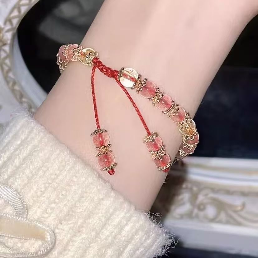 Campana tejida a mano cuerda roja pequeño libro rojo Miaojiang corazón de niña brillante pulsera joyería de mano con el mismo juego al por mayor