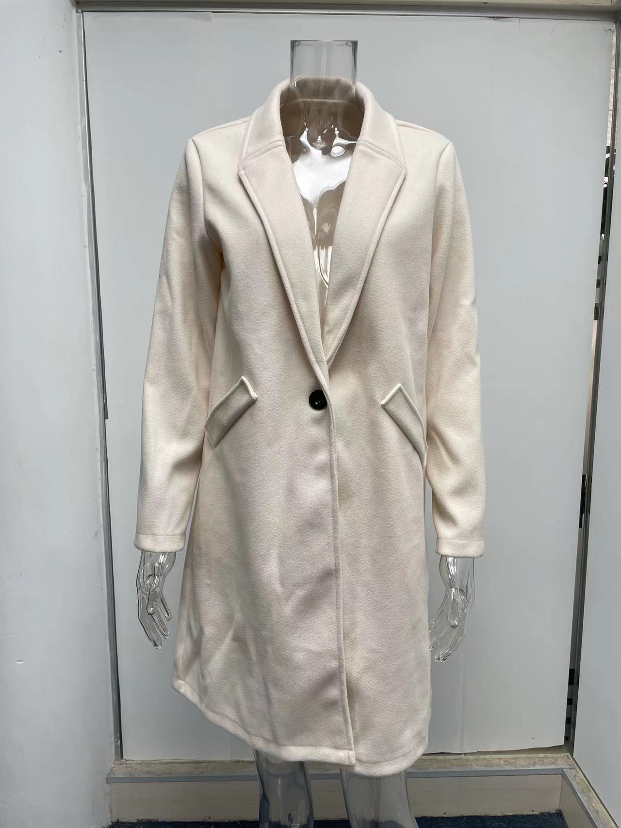 Title 8, Mid-length coat with solid lapels. Classic styl...