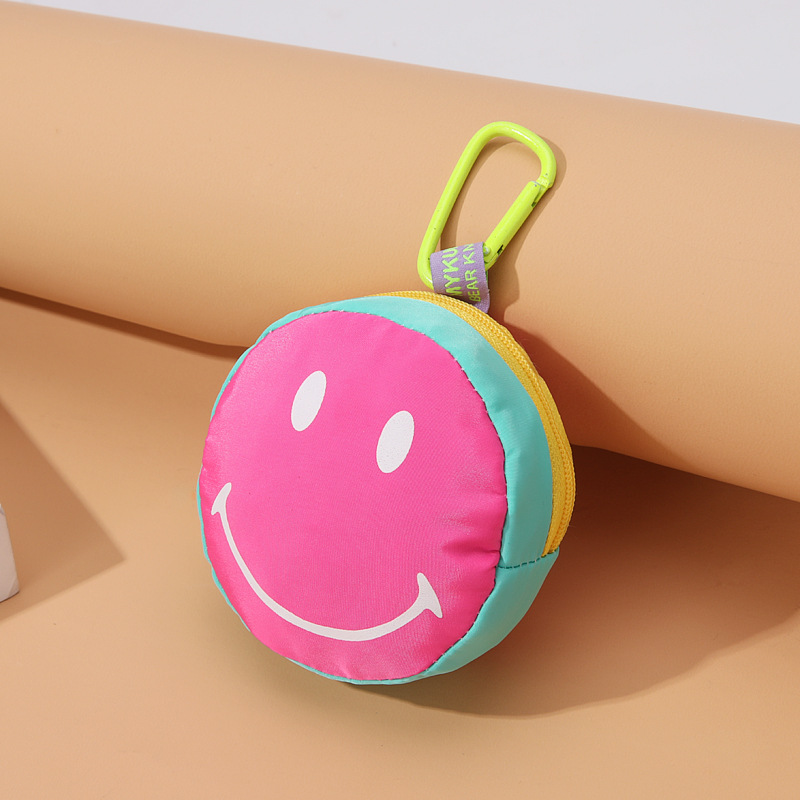 Nueva bolsa de cara sonriente de color caramelo de dibujos animados mini caja de color sólido colgante cambio bolsa de almacenamiento universal hombres y mujeres moda