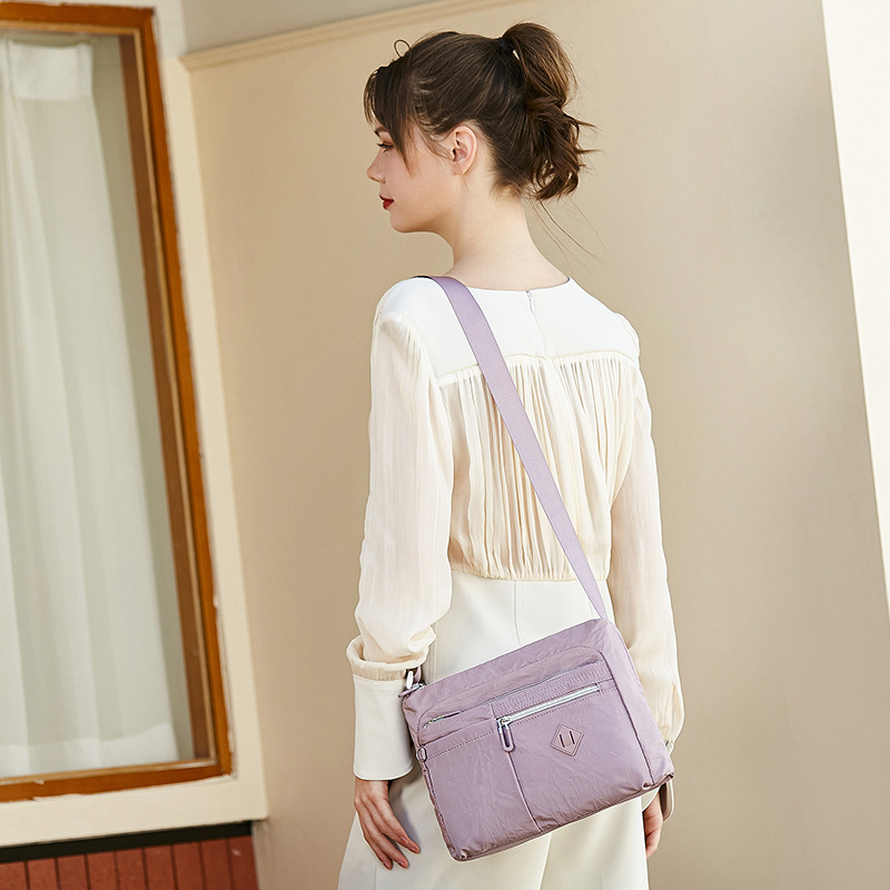 Bolso de mujer 2023 nuevo bolso de hombro impermeable de tela Oxford bolsa de mensajero de tela de nylon bolsa de viaje de mujer de mediana edad