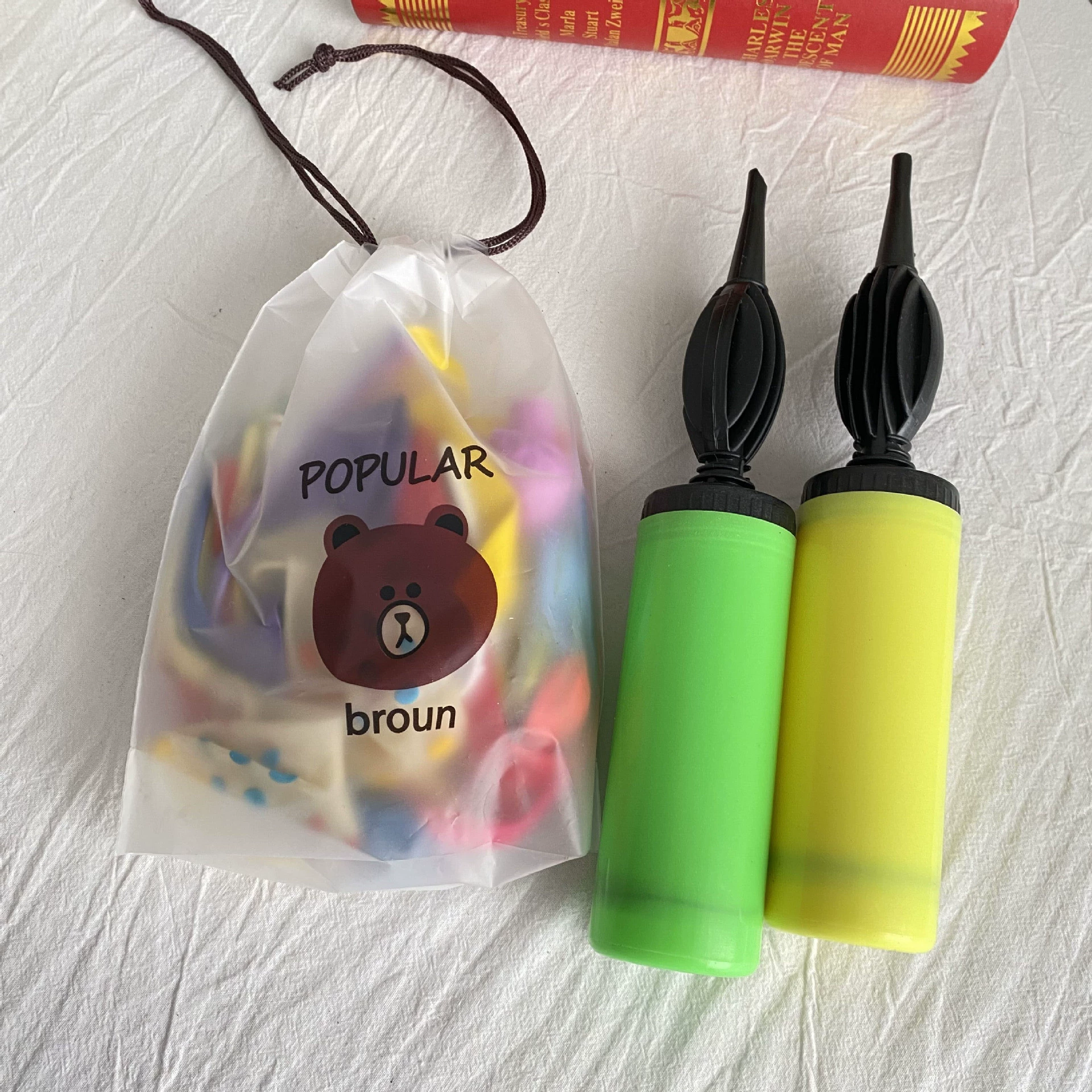 Handheld balloon, plastic air pump