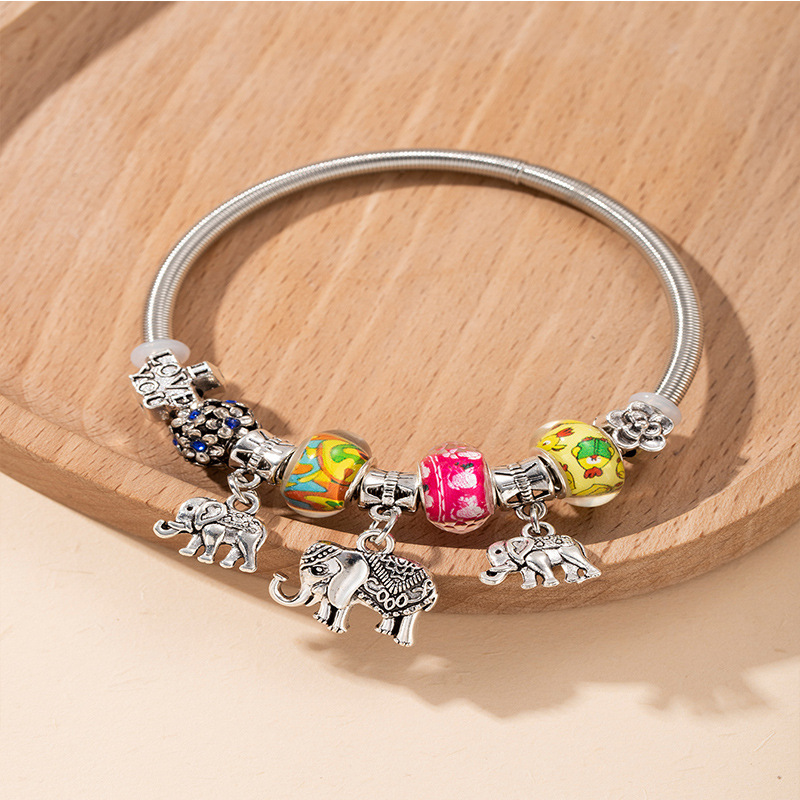 Panjia pulsera Dora DIY cuentas explosivas transfronterizas colgante de elefante letras de cristal cuentas pétalos pulsera ajustable