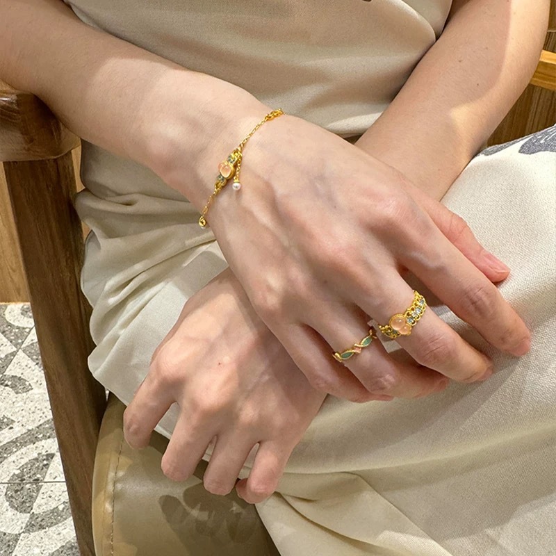 Zlatý obchod s perlou, nefritový tykevový prsten, náramek, oblek pro nový design výklenku, oblek pro živé exploze._voghion.com