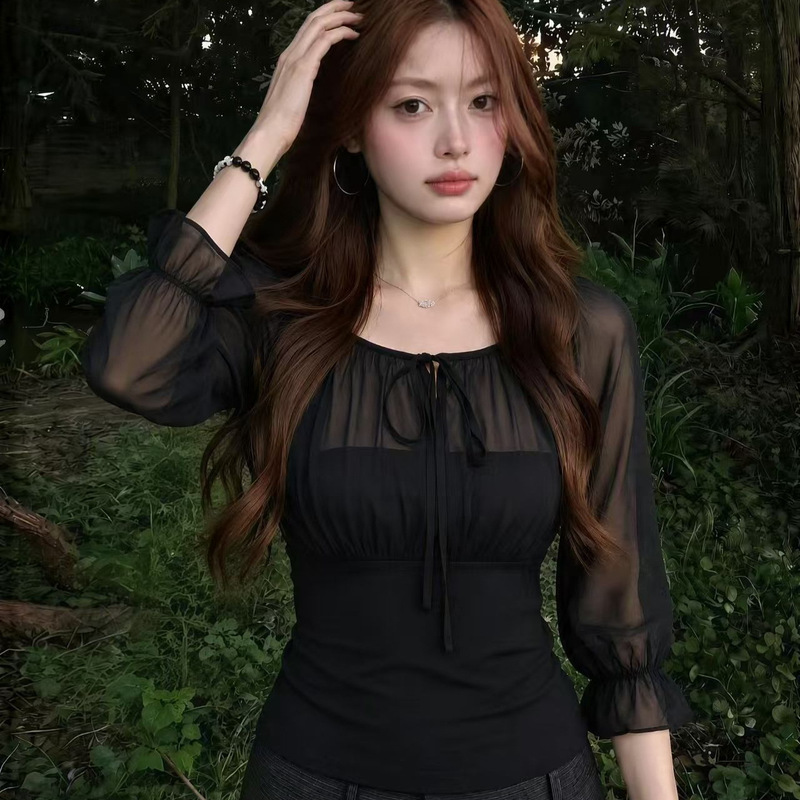 Korean-style black semi-transparent patchwork round-neck tie-up blouse for women, summer waist-cinching slim-fit lantern sleeve casual versatile top Korean-style black semi-transparent patchwork round-neck tie-up blouse for women, summer waist-cinching slim-fit lantern sleeve casual versatile top