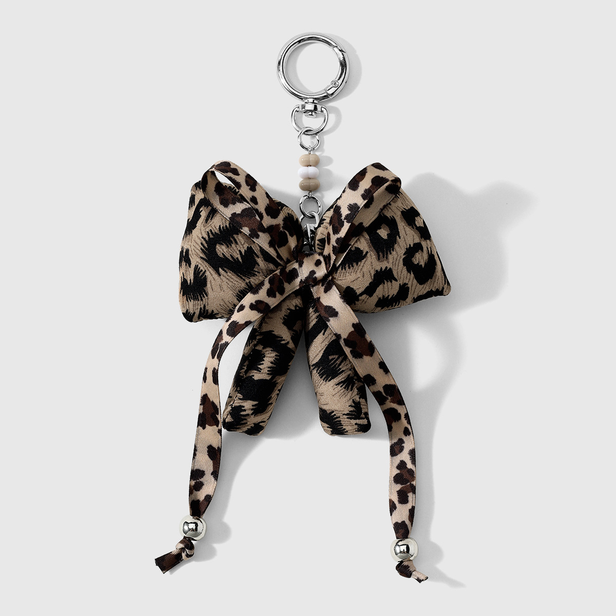 1 retro dulce cool girl marrón leopardo estampado arco arco amor DIY llavero bolsos colgantes