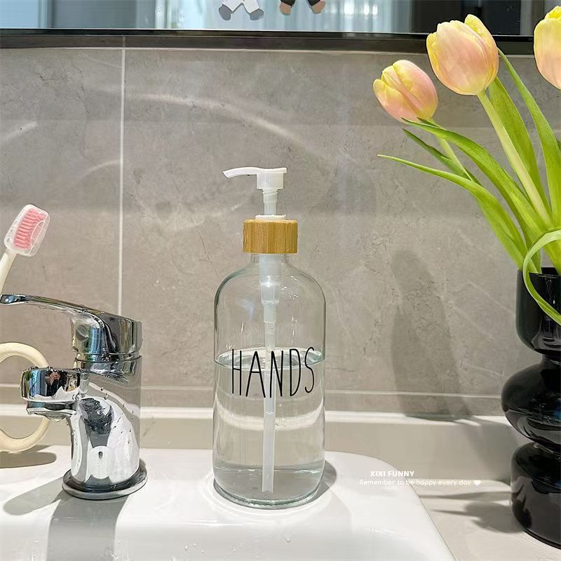 Gran volumen de vidrio nórdico envasado botellas vacías de baño desinfectante de manos gel de baño champú de presión en el lavabo de aire