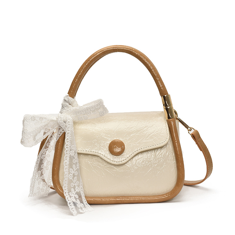 Bolso cuadrado pequeño estilo explosivo único exterior para mujer 2025 nuevo bolso de mensajero simple de color en contraste cuero de cera de aceite bolso de hombro todo fósforo de nicho