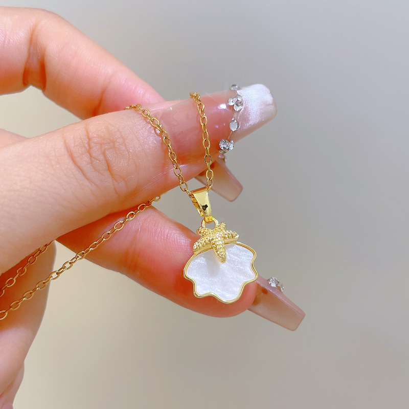 Colar de concha estrela do mar em aço titânio para mulher_voghion.com