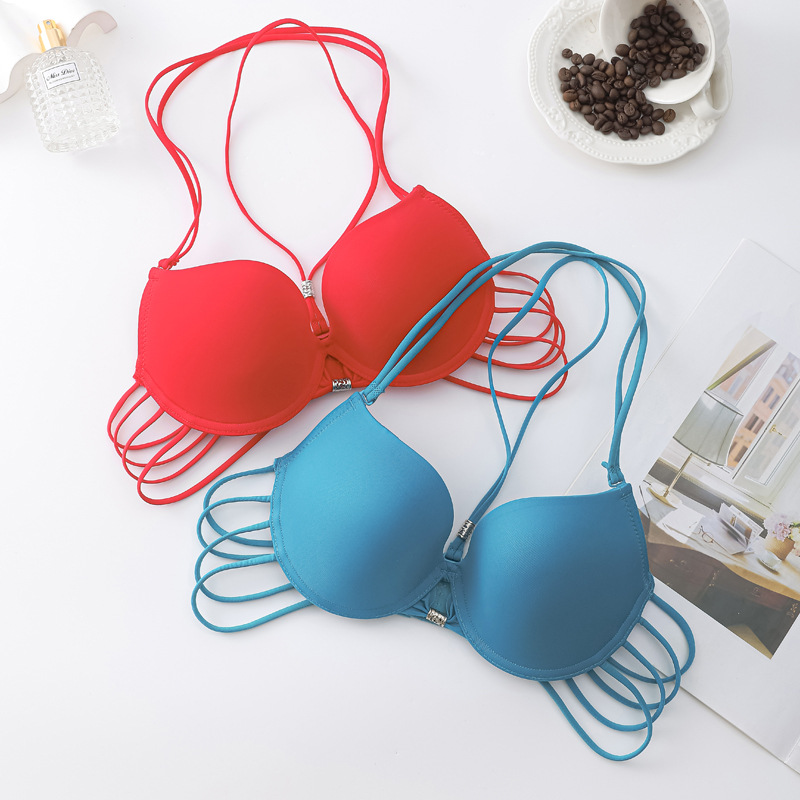 Fábrica de stock de pecho pequeño engrosado reunido brillante cinturón de cuello sin marca sexy ropa interior de moda para chicas