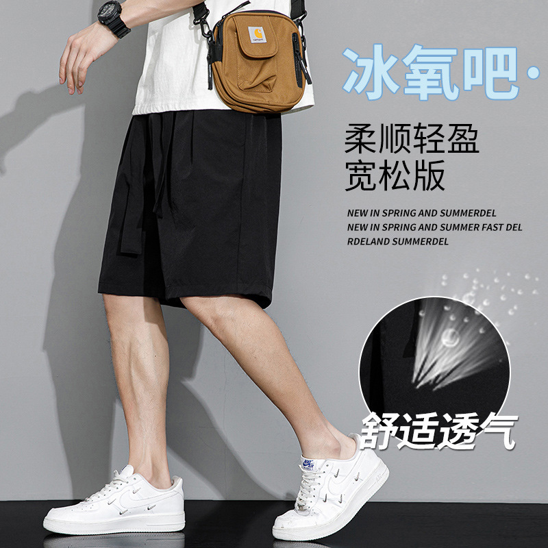 Pantalones cortos de moda de verano masculinos sueltos de color sólido, pantalones deportivos casuales de cinco puntos, pantalones grandes delgados de estilo de Hong Kong