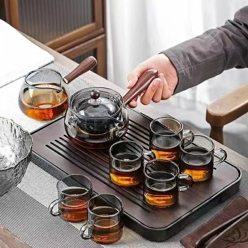 Nueva olla Xiaoyao 360 grados de vidrio borosilicato giratoria fabricante de té de vidrio juego de té traje hogar tetera