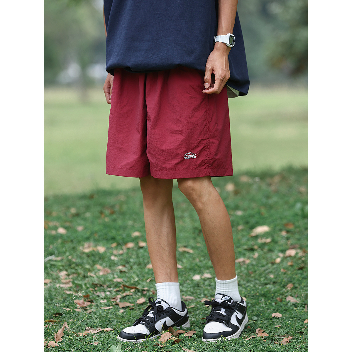 Verano al aire libre montañas y ríos pantalones cortos de color sólido para hombres pantalones de cinco puntos de playa sueltos de secado rápido comercio exterior al por mayor transfronterizo