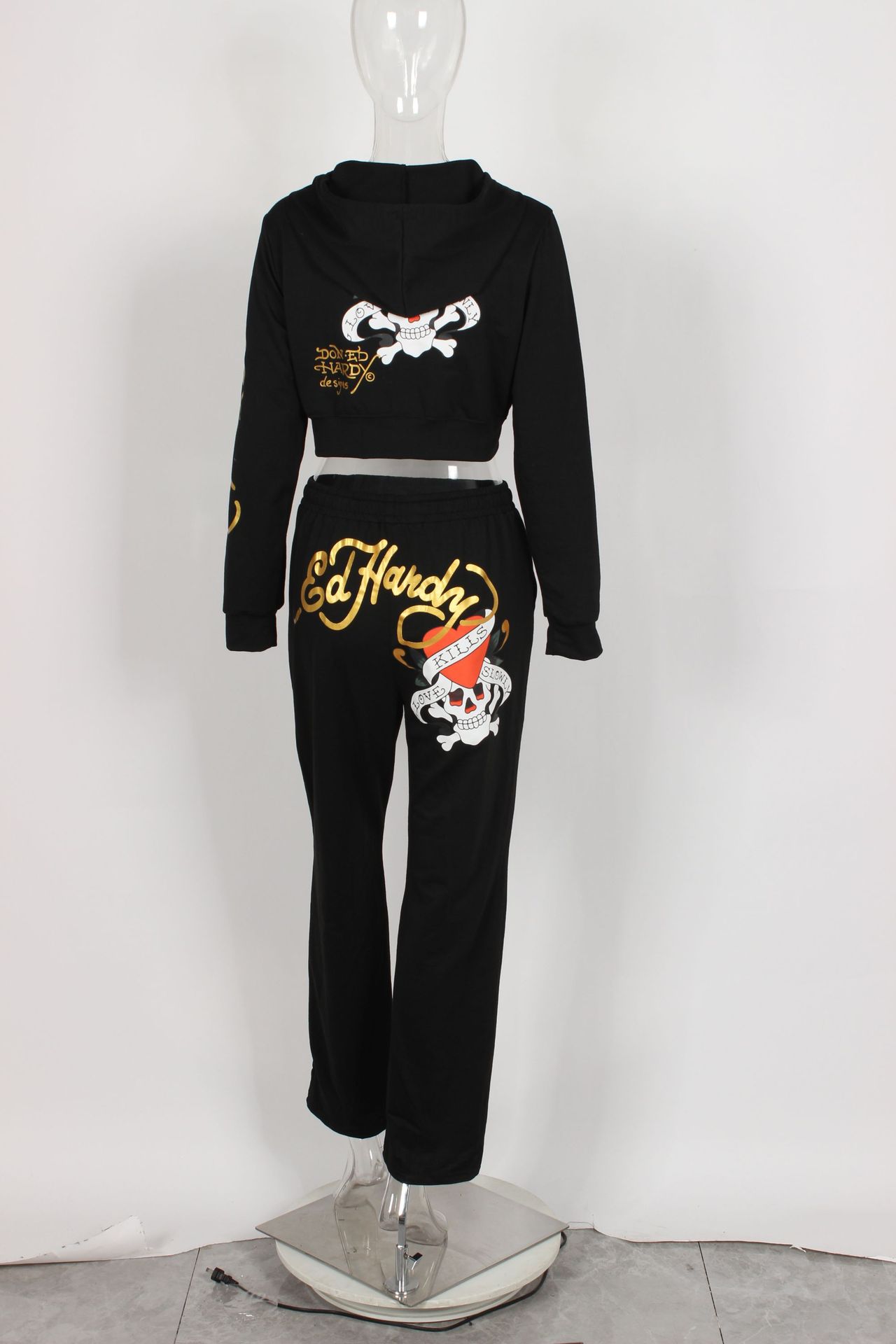 Conjunto de dos piezas para mujer, cárdigan corto básico con cremallera y estampado de calavera y corazón de Brand Street, pantalones rectos de cintura alta