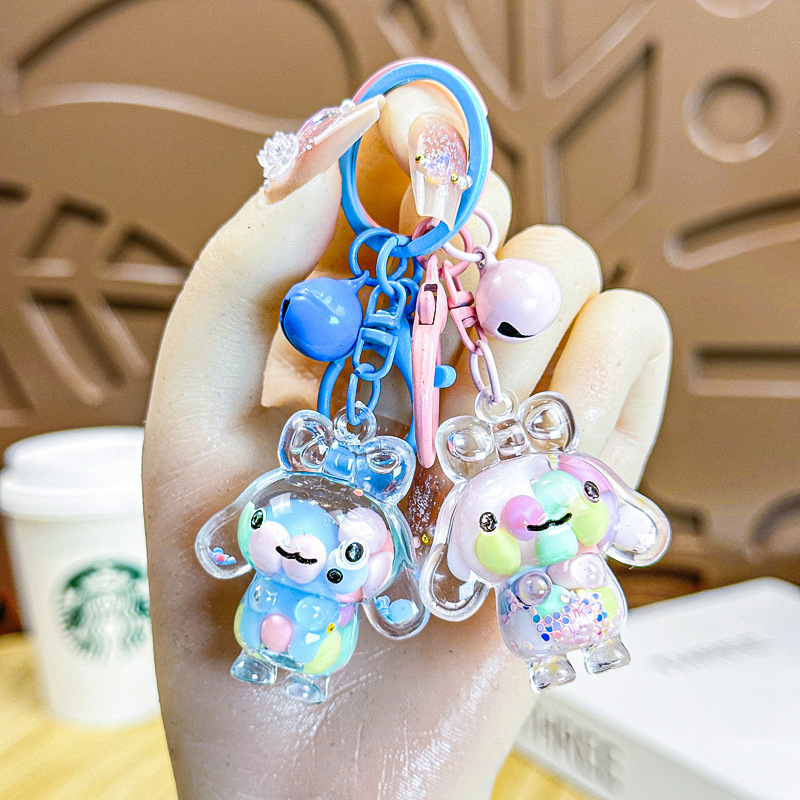 Caricatura creativa adorable acrílico frijoles de azúcar fluir arena jade Gui perro llavero colgante adornos puestos de productos al por mayor