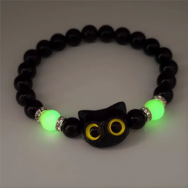 Glow-in-the-dark cat black cat yellow eyes