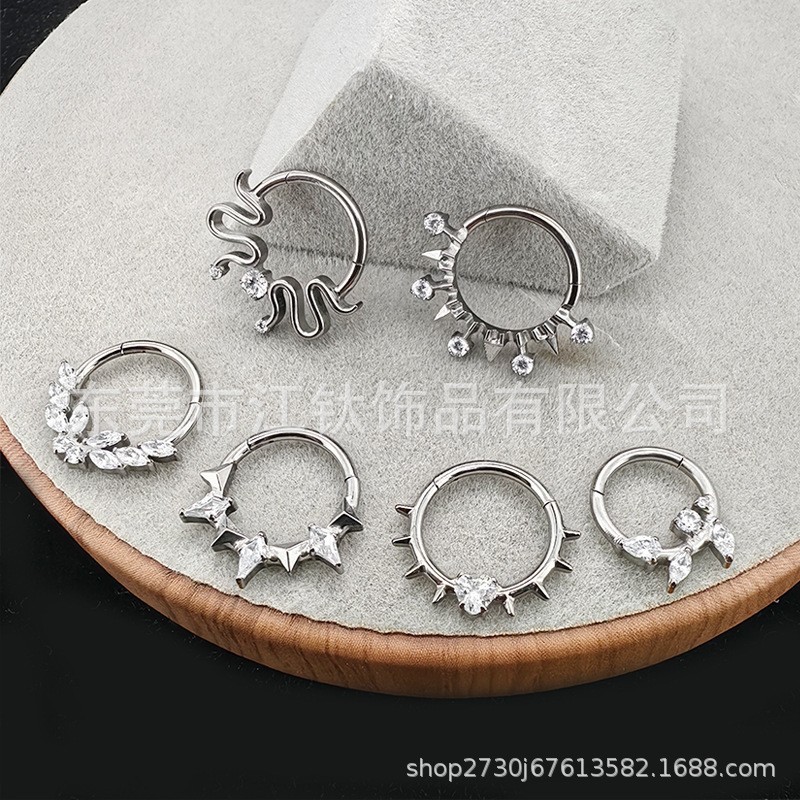 Silver pointed spike labret stud material detail