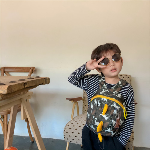 Children's schoolbag boy's cute dinosaur print backpack Korean version foreign trade new kindergarten primary school student anti-lost bag
