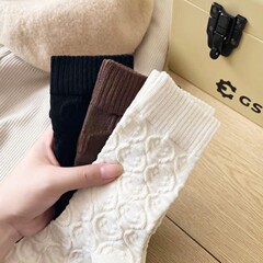 靴下の抗起球靴下の女性の靴下の精練綿のレリーフの中筒の靴下の骨がない靴下は平らで、足の純色の高い筒をなくします。