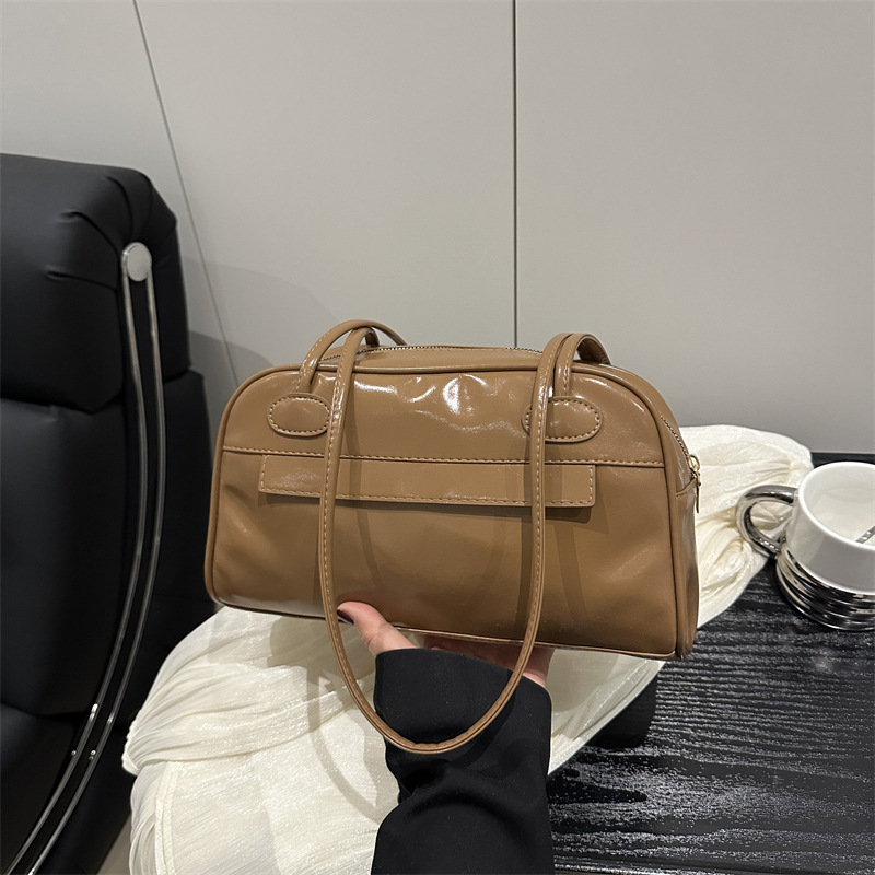 Bolso de bolos portátil con cremallera de múltiples bolsillos de gran capacidad de diseño de nicho para mujer 2025 nuevo bolso de hombro de cercanías para axila