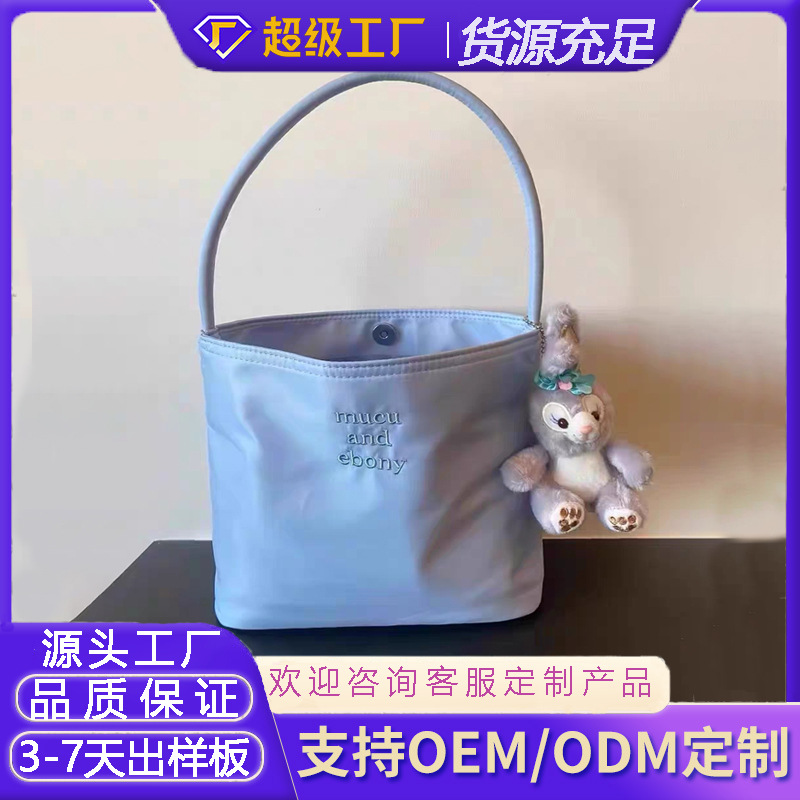 韩国2025新款水桶包包女简约休闲百搭手提包尼龙腋下包韩国小众