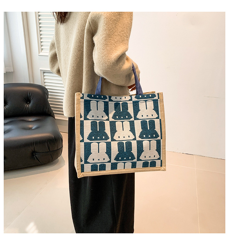 High-end mid-capacity canvas school commuting handbag 2024 new style fashionable and versatile linen single-shoulder tote bag undefined