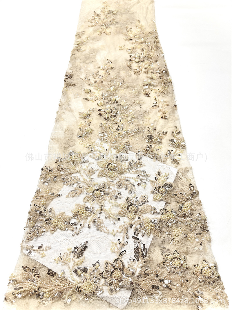 Fábrica directa venta al por mayor de alta calidad posicionamiento tubo de perlas tela de encaje vestido de novia moda tela de moda