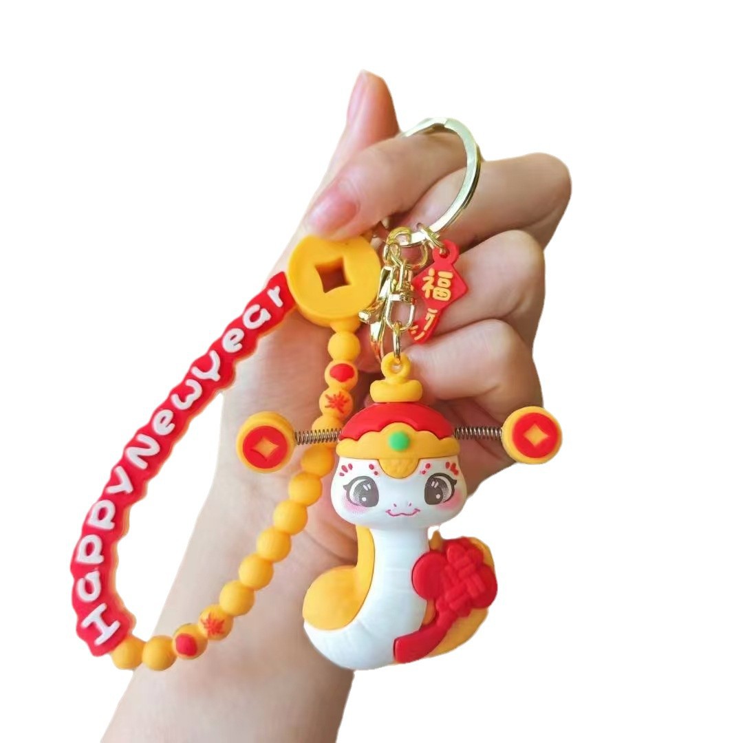 2025 nueva tendencia nacional de la serpiente de viento año llavero bolsos de celebración colgante pequeño regalo de este año de la vida colgante de llave de la suerte