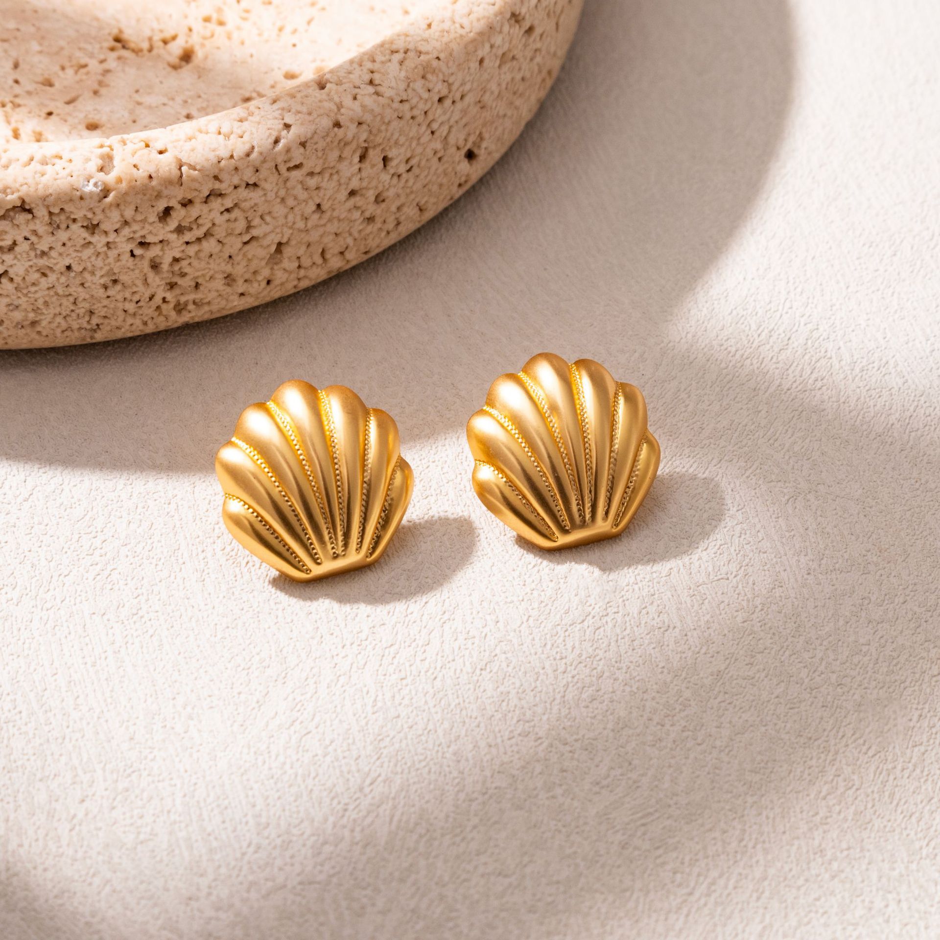 Elegant fashionable matte small design earrings