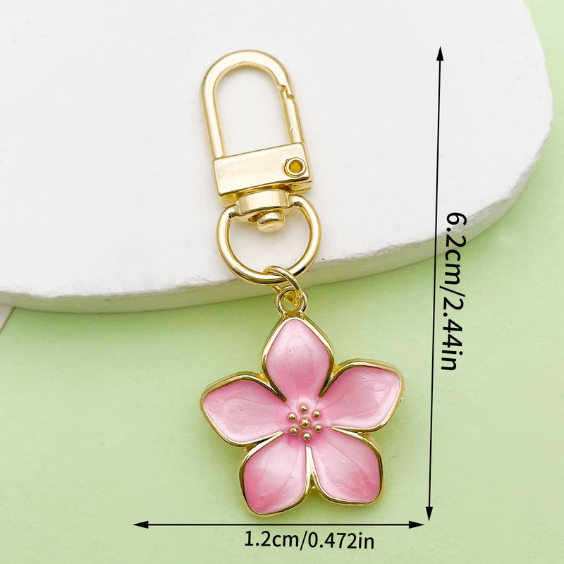 国境を越えた人気の真珠光沢のあるオイルドリップフラワーキーホルダー大きな桜の花びらシンプルなスタイルのUディスクバッグエアポッド小さなペンダント|undefined